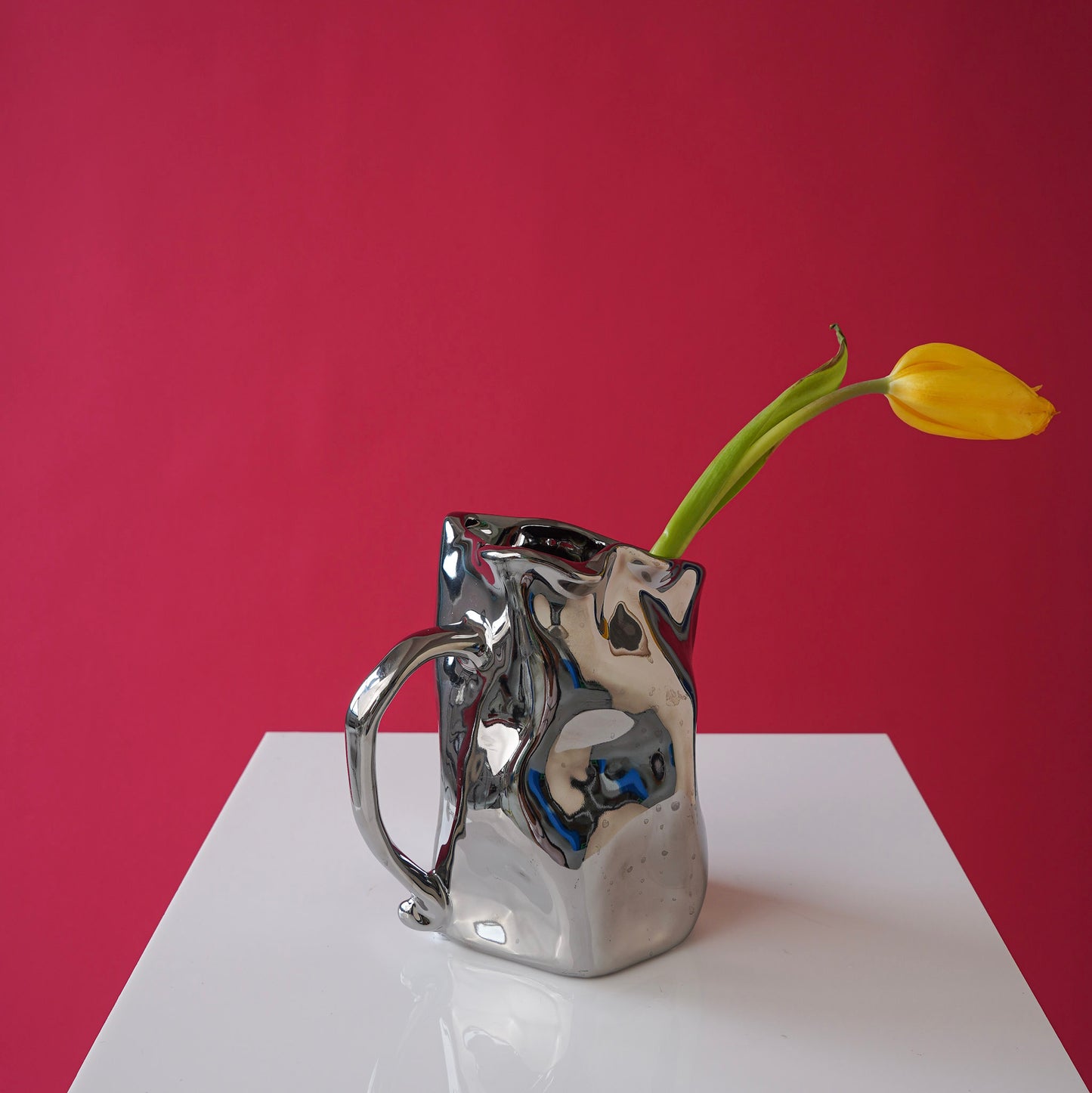 Metallic crumpled flower vase