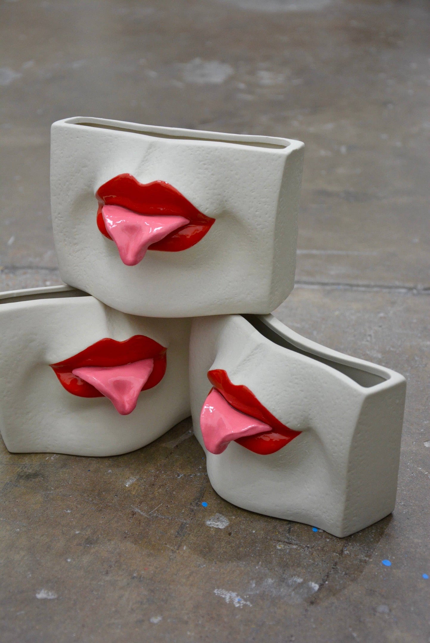 CERAMIC TONGUE-OUT VASE