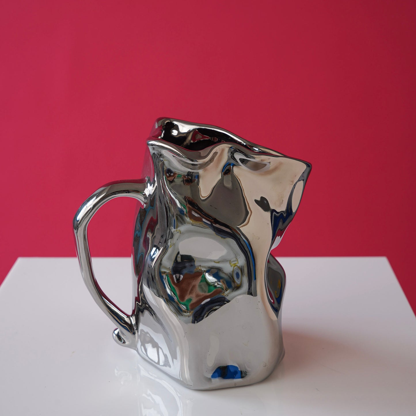 Metallic crumpled flower vase